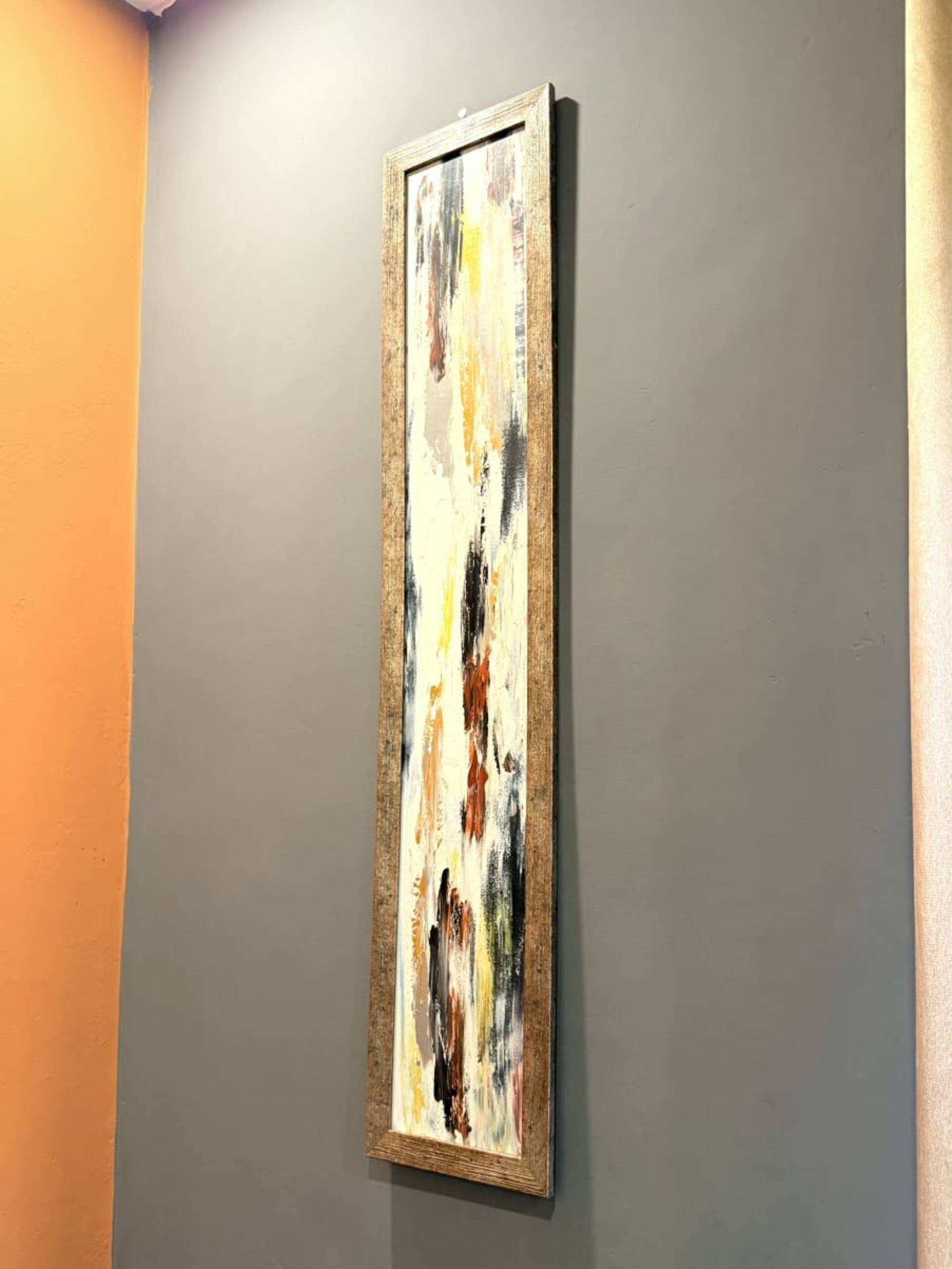 Framed artwork on the wall of The Amber Haven, the Aangan one-bedroom apartment facing Grand Jamia Mosque in Bahria Town Lahore
