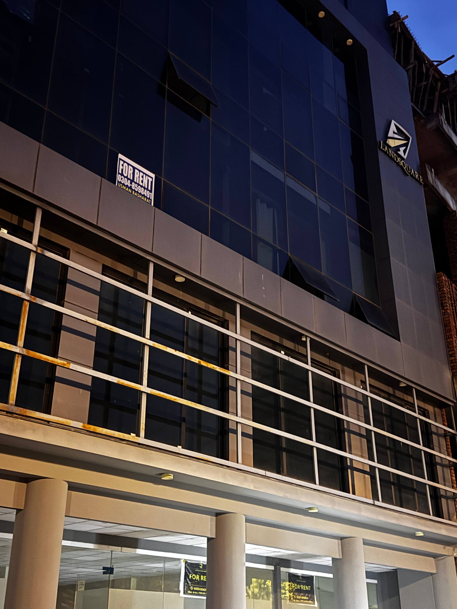 Exterior of the building housing the Aangan studio apartment near Islamabad International Airport