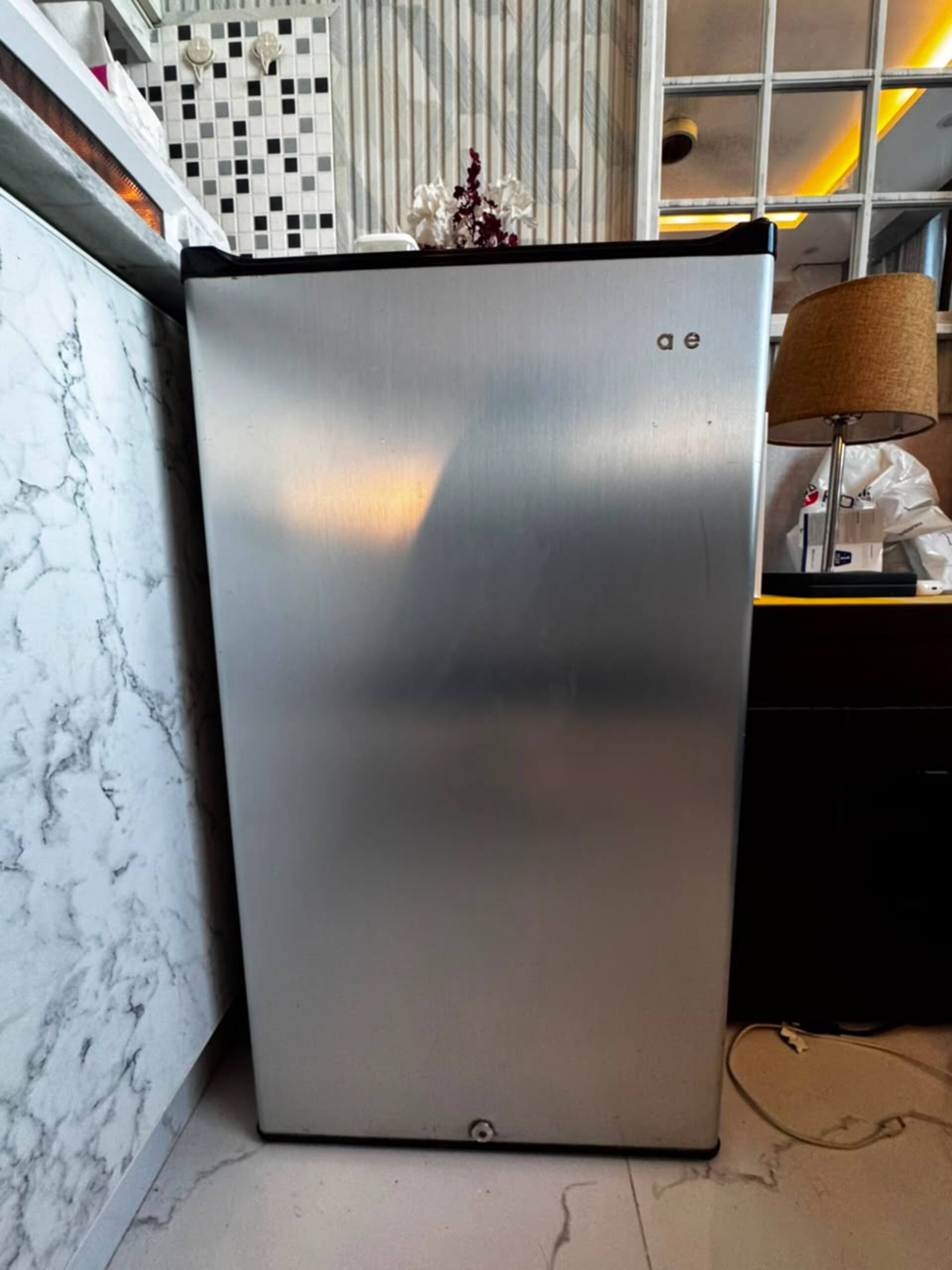 Refrigerator provided in the Aangan studio apartment near Islamabad International Airport