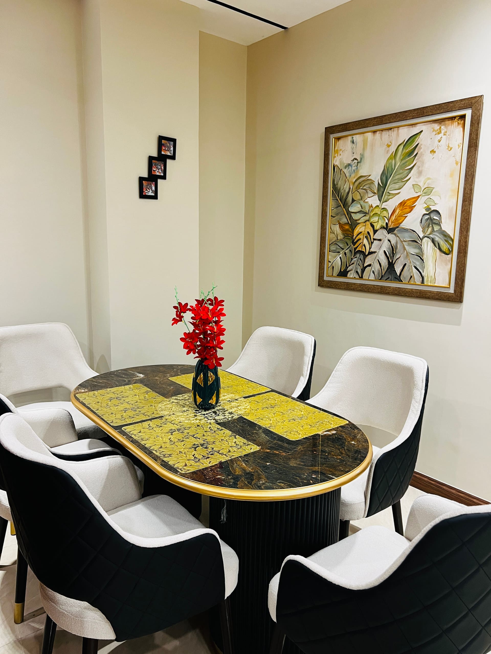 Dining area with a six-seat table in the 3-bedroom Aangan apartment in Zeta Mall, Islamabad