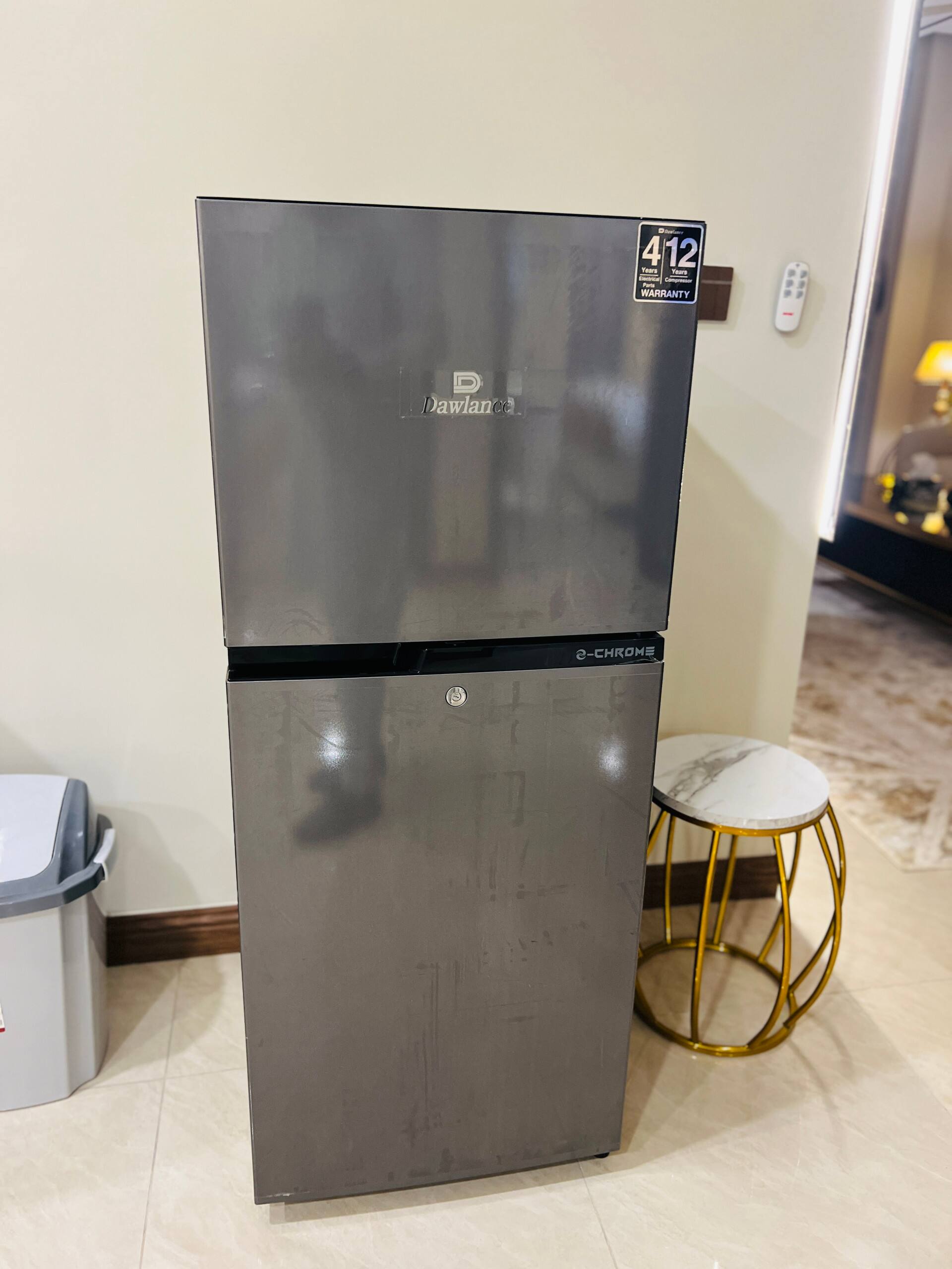Refrigerator in the kitchen of the 3-bedroom Aangan apartment in Zeta Mall, Islamabad