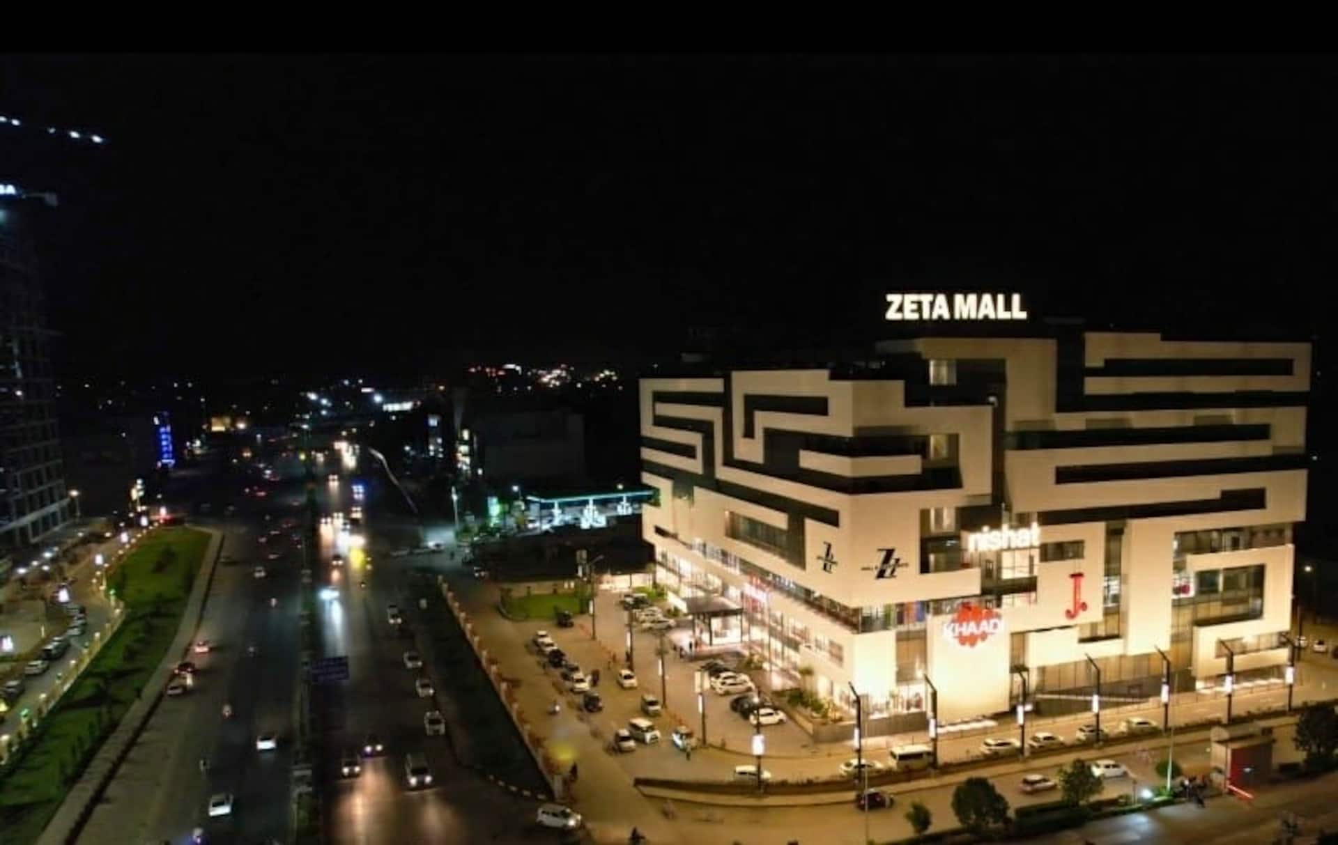 Exterior view of the Zeta Mall building in Islamabad at night